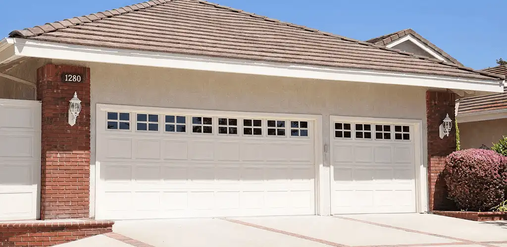 Residential garage door repair service for a double garage door in Pasadena, CA